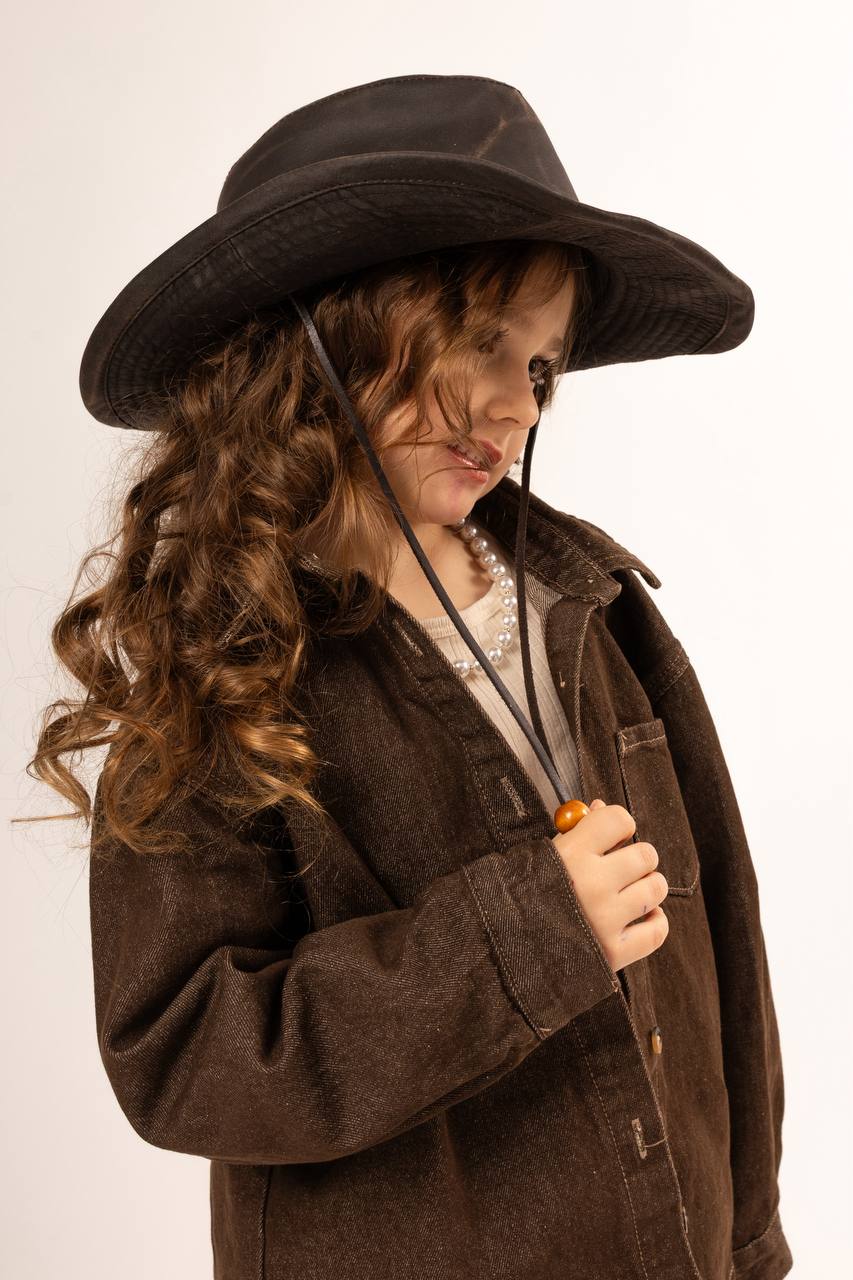 Moody portrait near a window